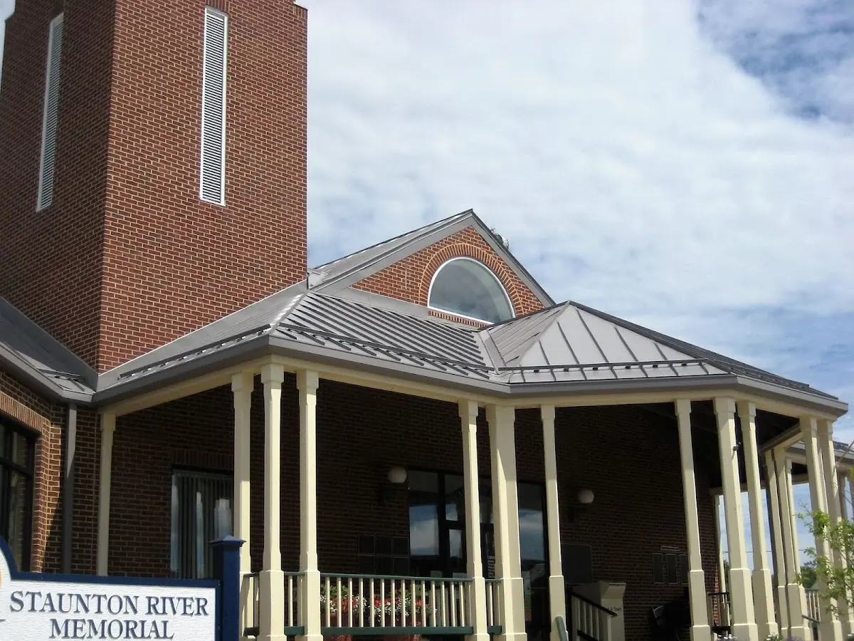 Skilled roofing craftsmen working on a residential roof in Texas Christian University